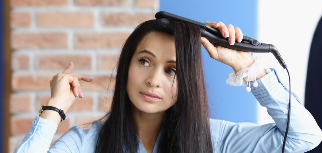 Brunette woman does curling of her hair with curling iron. Fast hairstyles for every day concept