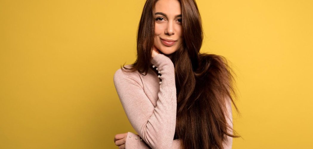 tender-beautiful-girl-with-dark-hair-wearing-pink-shirt-posing-studio-shot-blissful-brunette-woman (1)